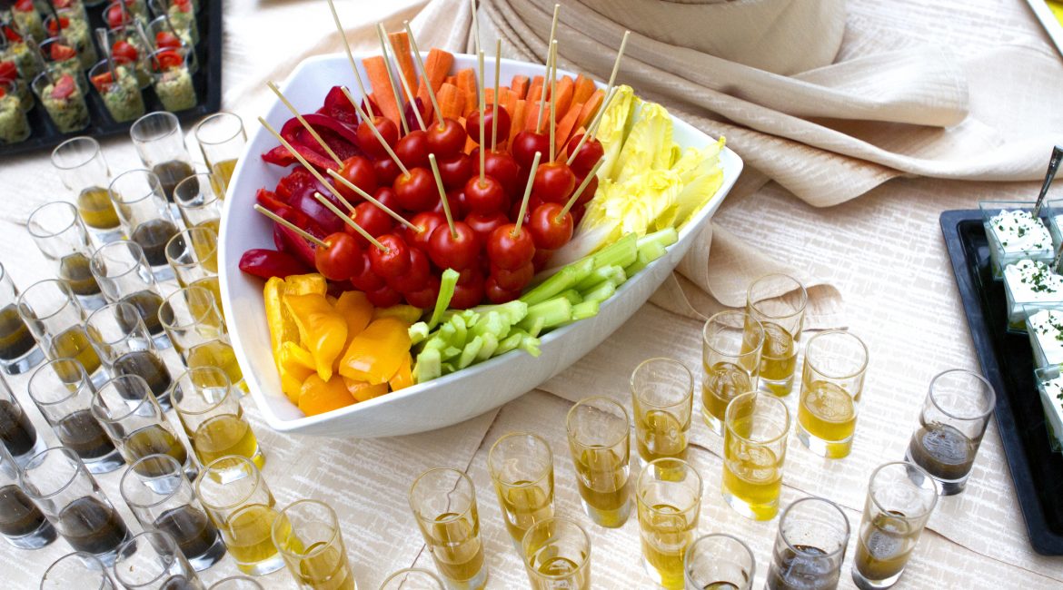 Vegetable crudite with cherry tomatoes, yellow peppers, celery and salad served with olive oil and vinaigrette.